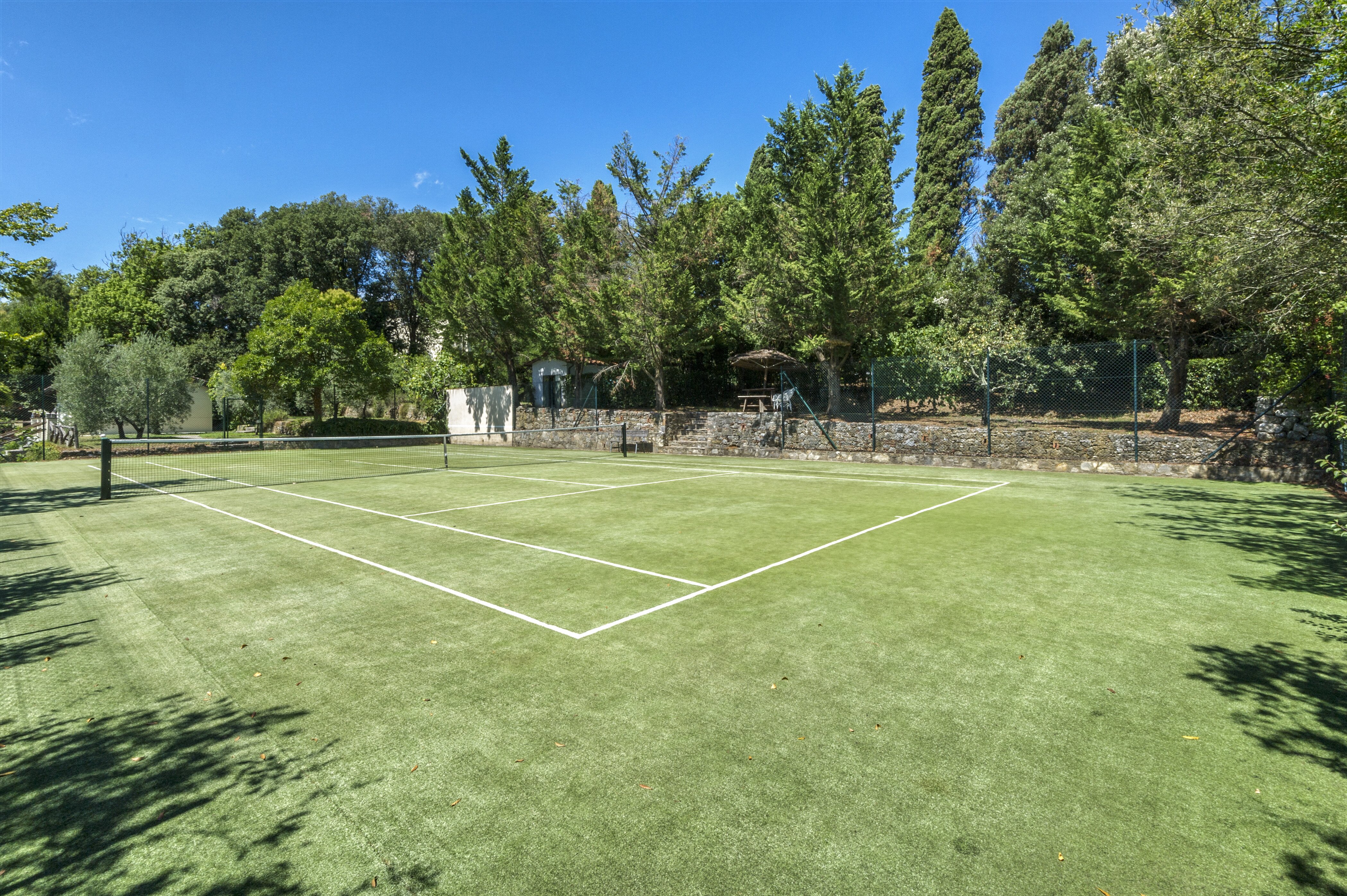 Tennis court shared with sister villa Novedieci