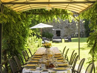 Further shaded dining area - adjacent to lawned area in the Borgo