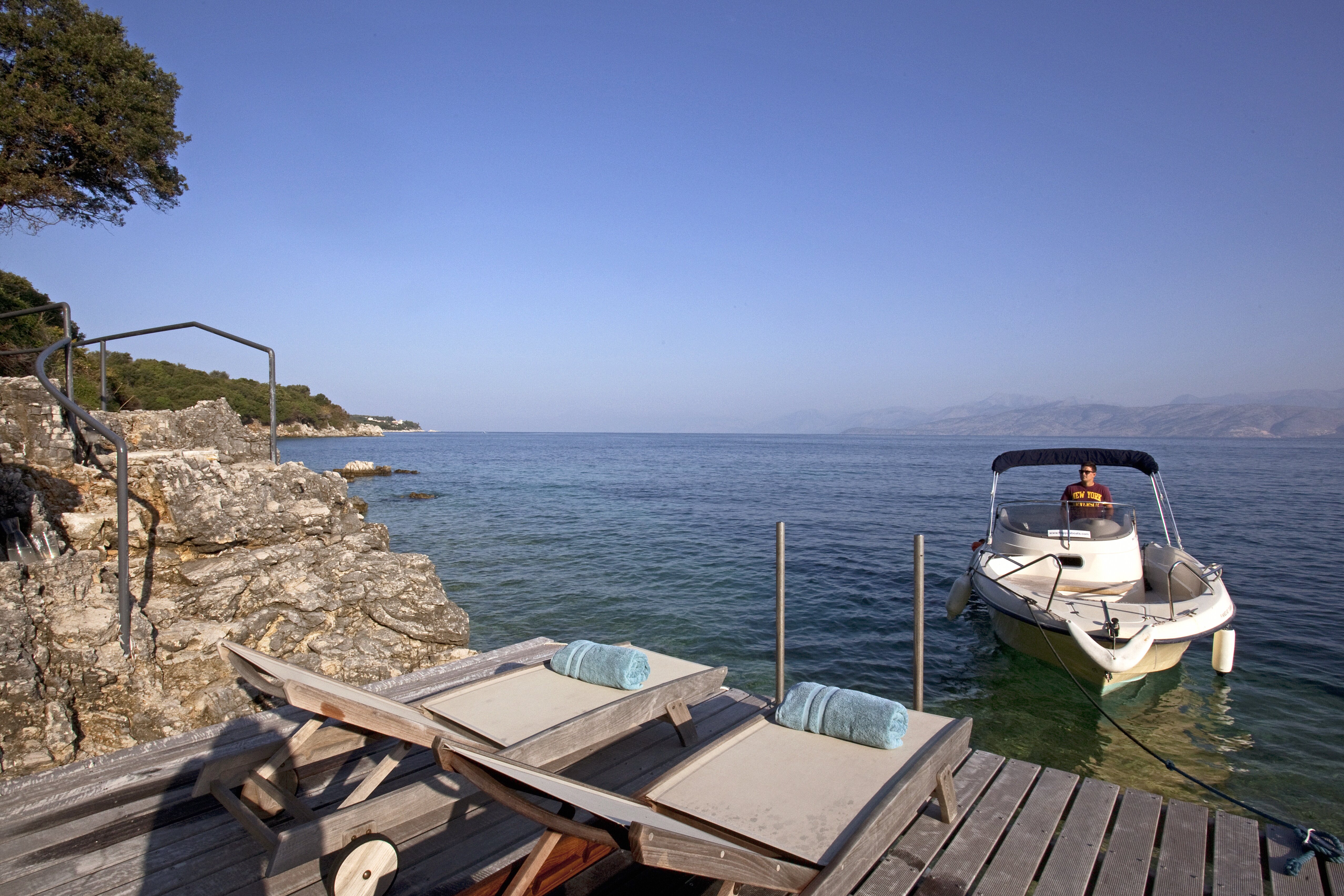 Relax on the deck or set sail from the private boat mooring
