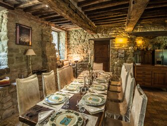 The Club - internal dining area with full kitchen, bar area and fireplace