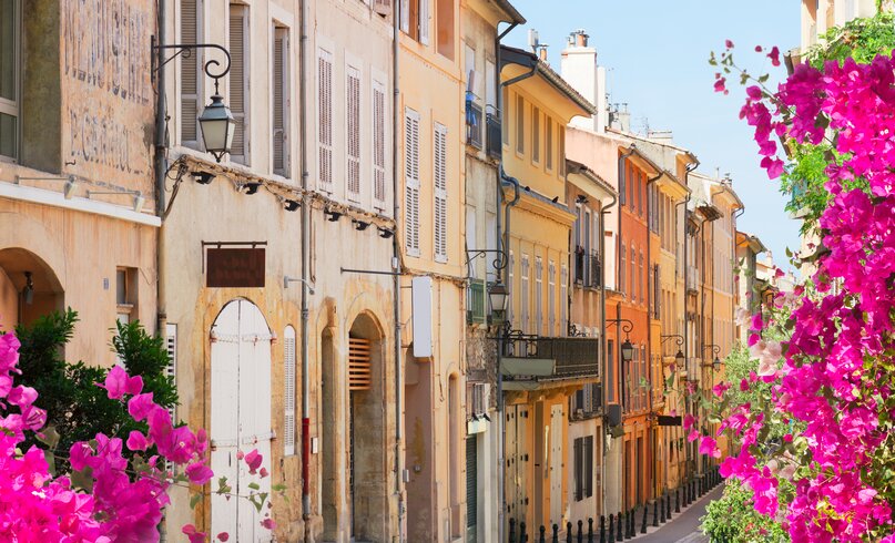 Old town street of Aix en Provence at summer day, France