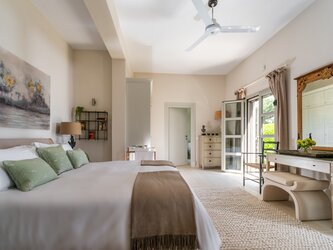 Second master double bedroom (super king size bed) with bathroom en suite and separate shower opening to terrace