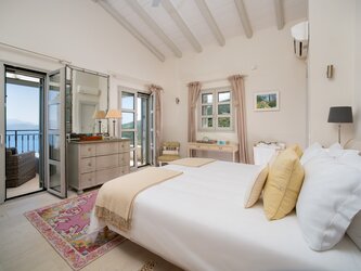 Master double bedroom (Super king size) opening onto terrace, with shower room en suite