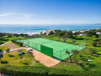 Private tennis court with stunning sea views